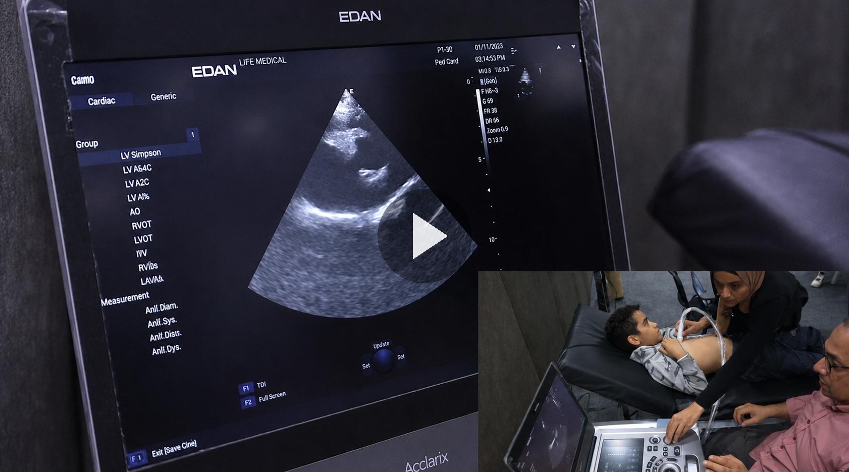 Doctor reviewing ultrasound scan in a modern clinical setting